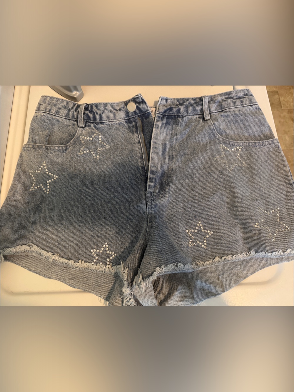 Women’s Light Wash Denim Shorts with Star Studs